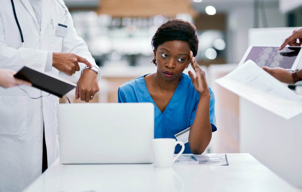 Addressing burnout in healthcare | Cure the Executive Edge | stressed out nurse
